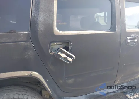 2003 Hummer H2 z USA, uszkodzony, nr VIN 5GRGN23UX3H140510